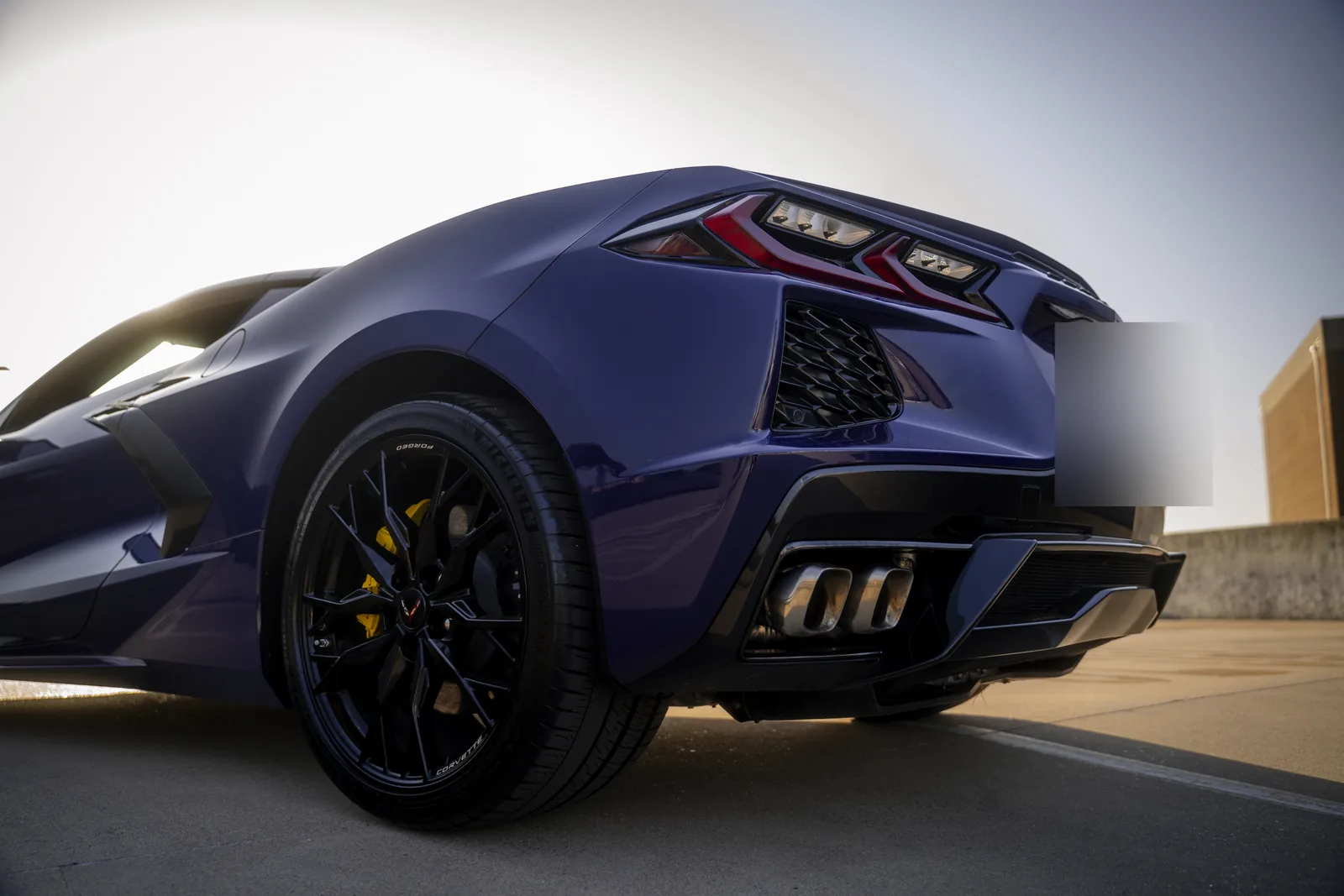 Hysteria Purple Corvette rear three-quarter detail with license plate obscured